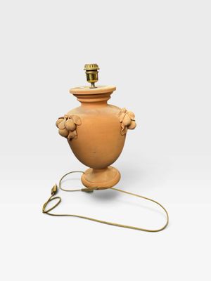 a lamp that is sitting on a table with a cord