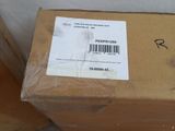 a box that is sitting on the floor next to a hose