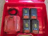 a red tool box that has four batteries in it