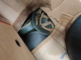 a cardboard box with a pair of shoes inside of it