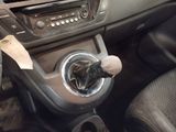a close up of a car ' s dashboard with a sticker on it