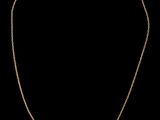 un collier en or dont la chaîne comporte un nœud