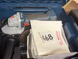 a tool box with tools inside of it on a table