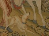 an image of a tapestry with a horse and a dog