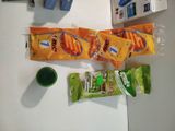 a bag of chips and a cup of coffee on a table