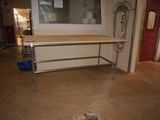 a picture of a room with a sink and a mirror