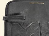 michael korsh black leather clutch bag with logo