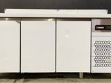 an image of a white kitchen cabinet with a black and white design