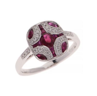 une bague ovale sertie d'un rubis et de diamants, en or blanc