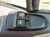 a close up of a car ' s interior with the control buttons on
