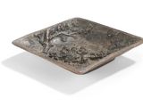 a small square metal bowl with a tree on it