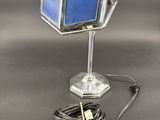 a lamp that is sitting on top of a table