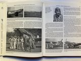 an open book with pictures of military men and planes
