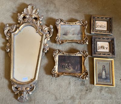 beaucoup de photos et un miroir posé par terre