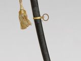 an image of a very nice looking dagger with a very long handle