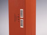 an orange box with a white label on it