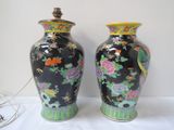two vases that are sitting on a table