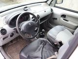 a small car with a steering wheel and a leather seat