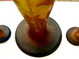 three vases that are sitting on a table