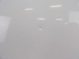 a picture of a blurry picture of a person in a chair