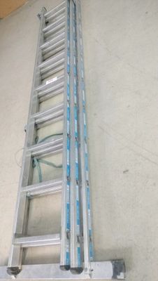 a ladder that is attached to the wall of a building
