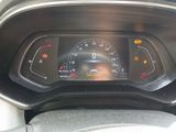 a car dashboard with a speedometer and a clock on it