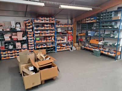 a room with a lot of boxes and boxes on the floor