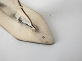 an old iron that is sitting on a table