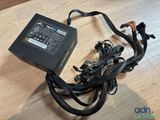 a close up of a computer power supply sitting on a table