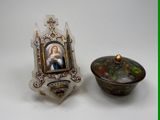 a picture of a woman in a picture frame next to a bowl