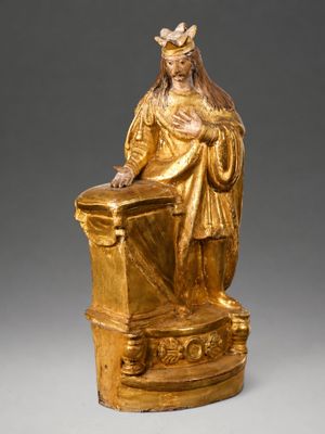 une image représentant une statue en or d'une femme coiffée d'une couronne
