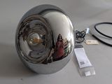 a shiny chrome ball with a black cord on the side
