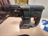 a drill that is sitting on a table in a room