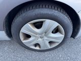 a close up of a tire on a car ' s rim