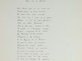 an old handwritten letter with black ink on a white paper