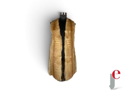 an image of a fur vest on a mannequin stand