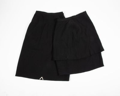 a pair of black shorts on a white background
