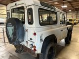 an image of a white land rover in a garage