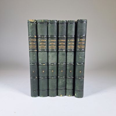 four green books sitting on top of each other on a white surface