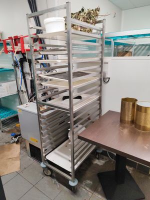 an image of a kitchen with a rack of food on it