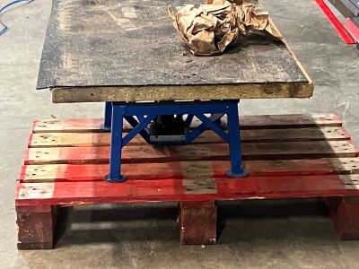 a picture of a work bench with a piece of paper on top of it