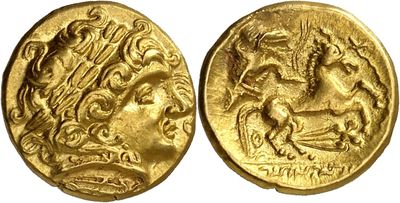 a gold coin with an image of a man on a horse