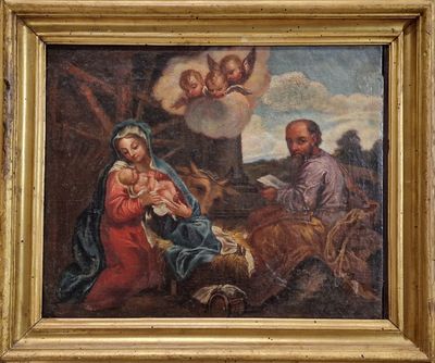 tableau représentant la Nativité de Jésus avec des anges et des moutons