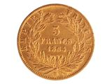 l'image d'une pièce d'or sur laquelle figure le chiffre 5