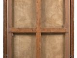 an old wooden window with a glass pane in the middle