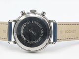an image of a close up of a watch on a white surface