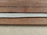 a piece of wood that has been cut and is laying on the floor