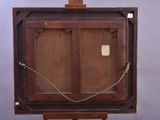 a picture of an old wooden camera on a tripod
