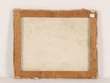 an old picture frame sitting on top of a white surface