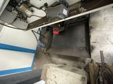 an overhead view of a machine in a factory
